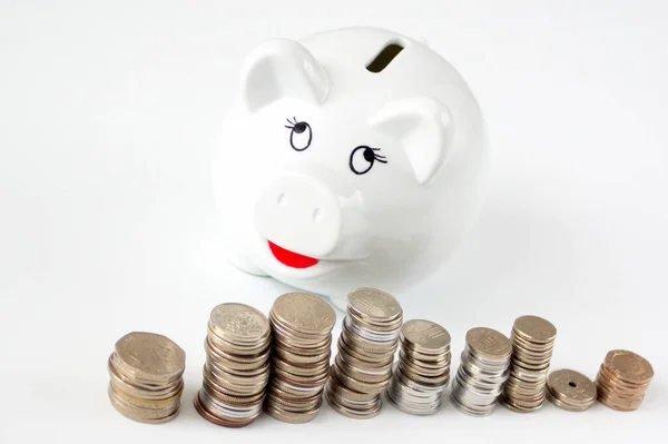 High Angle Closeup White Piggy Bank Stack Coins White Surface — Fotografia de Stock