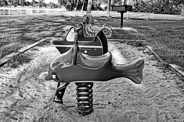 Greyscale Shot Attractions Children Playground — Zdjęcie stockowe