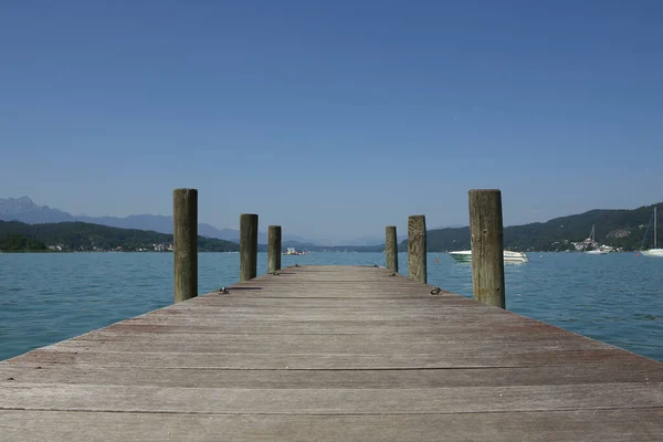 Wooden Pier Facing Blue Horizon —  Fotos de Stock