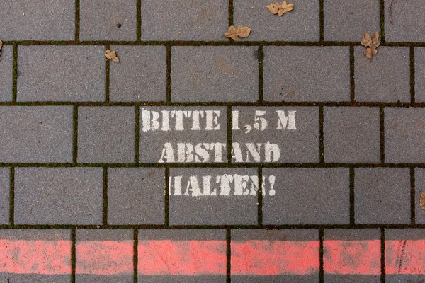 Text German Meaning Please Keep Distance Meters Asphalt — Stok fotoğraf