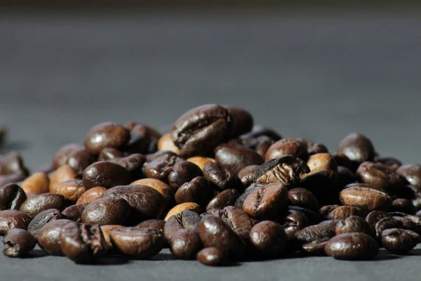 Closeup Roasted Coffee Beans Gray Surface Blurry Background — Stock Fotó