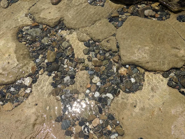 Closeup Pebbles Water Background Textures — Stockfoto