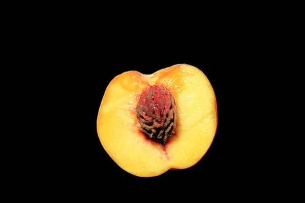 Closeup Halfripe Peach Lights Isolated Black Background — Foto Stock