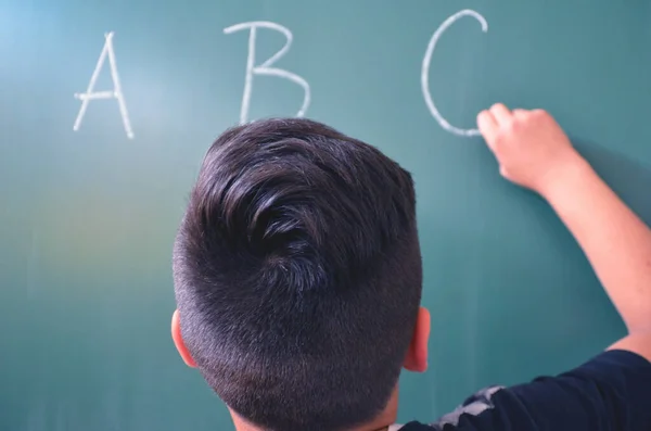 Closeup Shot Student Writing Blackboard — стоковое фото