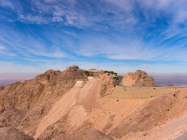 Jabal Hafeet a mountain in the region of Tawam, on the border of the United Arab Emirates and Oman. clipart