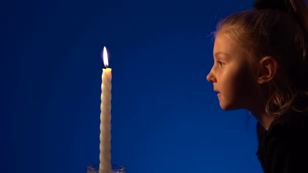 Footage Little Girl Blowing Out Candle — Stock Video