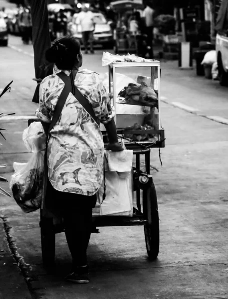 Vertical Shot Lady Selling Something Street Grayscale — Stock Photo, Image