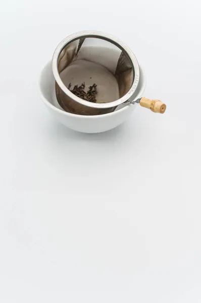 Metal Tea Strainer Tea Leaves Ceramic Bowl White Background Text — Stock Photo, Image