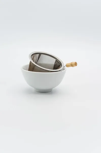 Metal Tea Strainer Tea Leaves Ceramic Bowl White Background Text — Stock Photo, Image