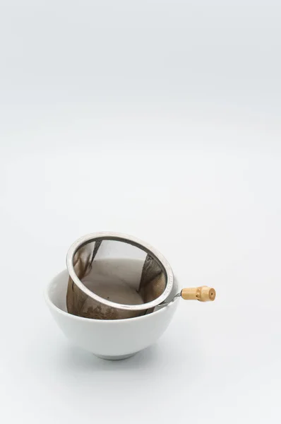 Metal Tea Strainer Tea Leaves Ceramic Bowl White Background Text — Stock Photo, Image
