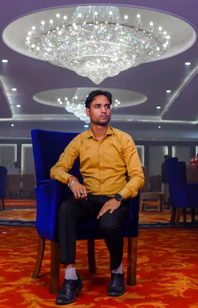 Serious Indian Man Yellow Casual Clothes Sitting Elegant Chair — Photo