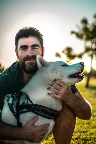 Portrait Smiling Adult Argentinian Man Posing His Akita Dog Park — Stock Photo, Image