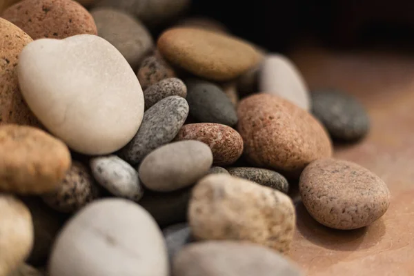 Una Pila Piedras Mar Lisas Tonos Marrones Grises Claros Imagen de archivo