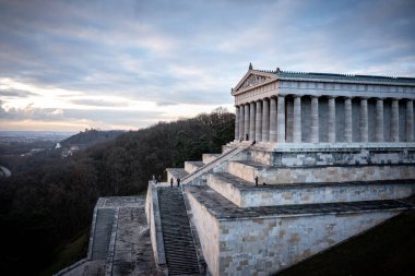 A scenic shot of the Walhalla memorial in Germany under the cloudy sky clipart