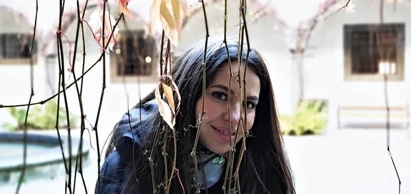 Young Caucasian Dark Haired Female Wearing Coat Standing Plants Smiling — Foto de Stock