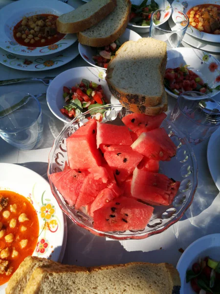 Vertical Shot Watermelon Bread Slices Salads Table Outdoors Sunny Day — Stock Photo, Image
