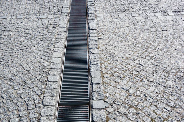 Closeup Long Metal Rusty Rain Drain Stone Pavement — Stock Photo, Image