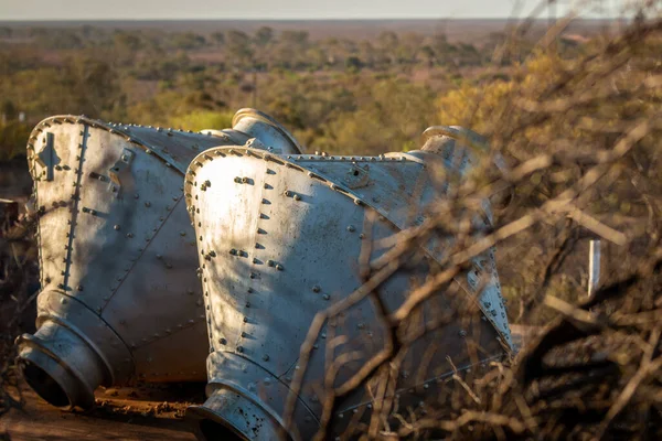 Closeup Shot Metal Cement Barrels Grass — Stock fotografie