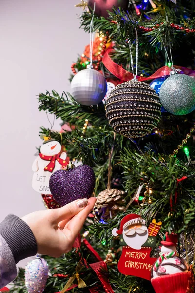 Female Hand Hanging Christmas Decoration Ornament Christmas Tree — Foto Stock