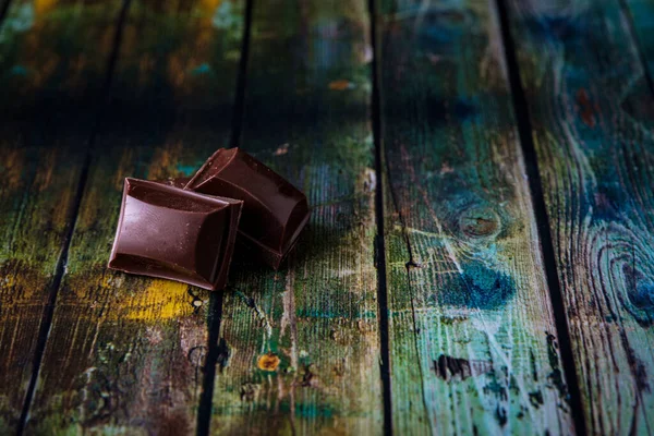 Closeup Two Chocolates Dark Background — Φωτογραφία Αρχείου