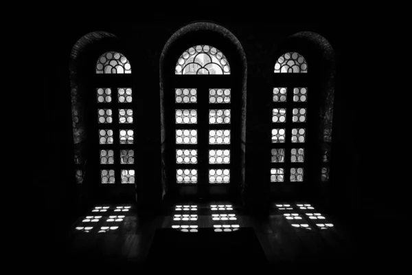 Light Penetrating Dark Room Window Panes — 스톡 사진