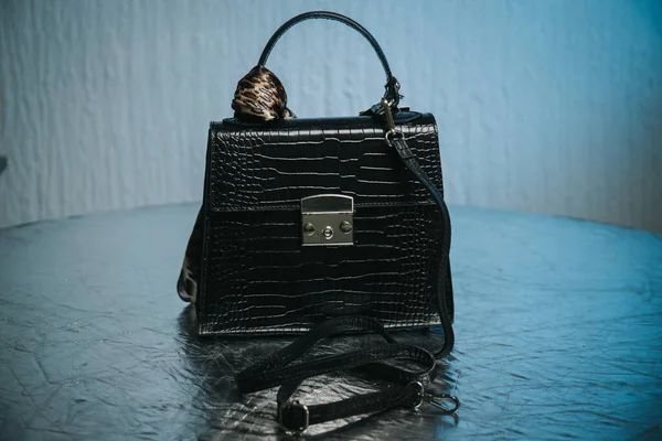 Closeup Beautiful Black Leather Handbag Silver Surface — стоковое фото
