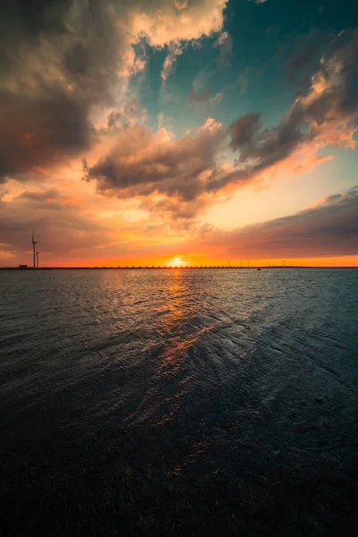 Vertical Shot Beautiful Sunset Sea Oosterscheldekering Netherlands — Zdjęcie stockowe