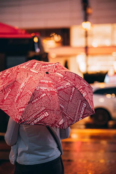 Vertical Back View Person Red Umbrella Text City Night — Foto de Stock