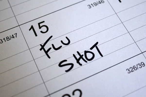 Closeup Calendar Reminder Flu Shot 15Th — Zdjęcie stockowe
