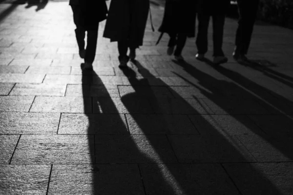 Grayscale Shot Shadows People Walking Street — Stock Photo, Image