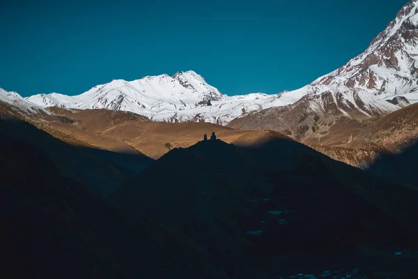 Beautiful View Snowy Mount Kazbek Georgia Caucasus Dark Blue Sky — Stockfoto