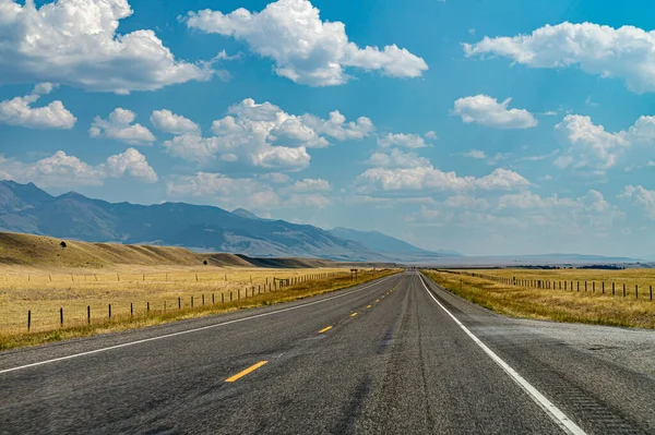 Empty Straight Road Steppes Blue Cloudy Sky — Stockfoto