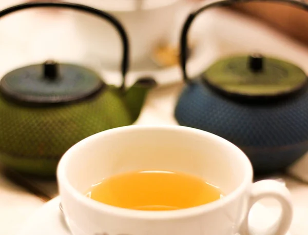 Closeup Cup Tea Teapots Table — Stock Photo, Image