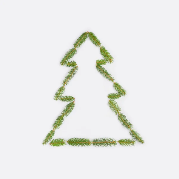 Christmas Tree Symbol Made Branches Isolated White Background — стоковое фото