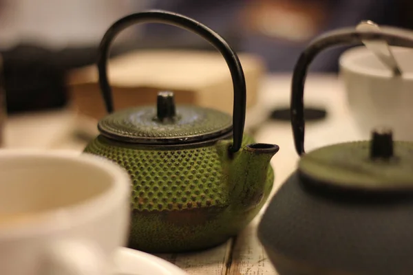 Closeup Teapots Cups Table — Stock Photo, Image