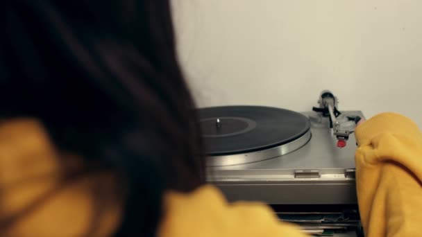 Female Hand Holding Music Record Vintage Film Filter Retro Filtered — Vídeo de Stock