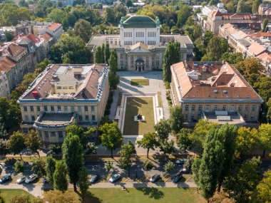 A Drone shot of a beautiful city Zagreb, in Croatia with red roof buildings clipart
