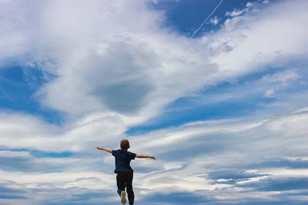 Rear View Boy Running Cloudy Sky — Stock Photo, Image