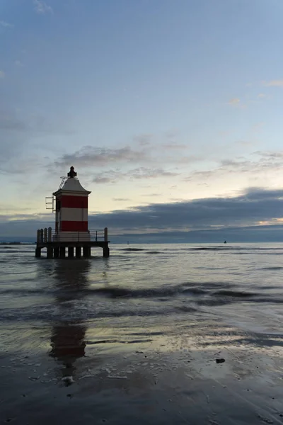 Vertical Shot Pier Lighthouse Calm Evening — Stockfoto
