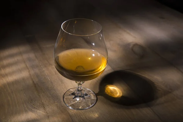 High Angle Shot Glass Brandy Wooden Table — Stockfoto