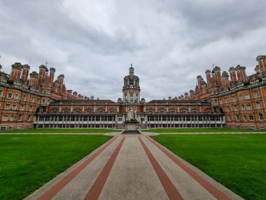 The cloudy and gloomy sky over the Royal Holloway, University of London Egham, UK clipart