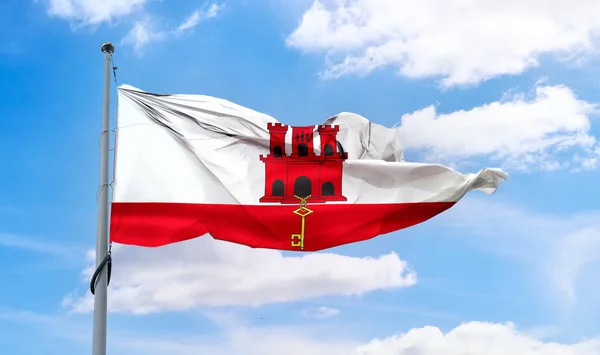 Gibraltarska Flaga Machająca Słupie Błękitnym Niebie — Zdjęcie stockowe