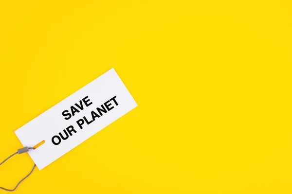 Tag Avec Texte Écrit Sauver Notre Planète Sur Fond Jaune — Photo
