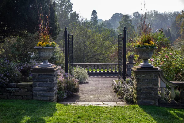The open entrance gates to the Morris Arboretum of the University of Pennsylvania