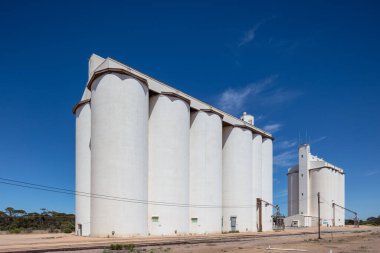 A scenic shot of grain silos situated in the wheat belt region of South Australia clipart