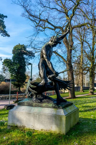 Brugge Belgium Feb 2018 Vertical Shot Statue Person Holding Bird — Stock Photo, Image