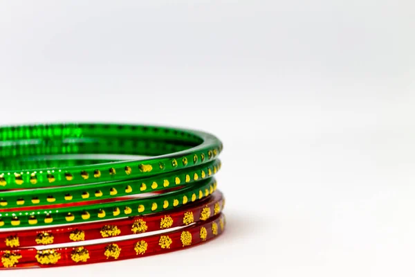 Closeup Shot Red Green Glass Bracelets Bangles Golden Dots White — Stock Photo, Image