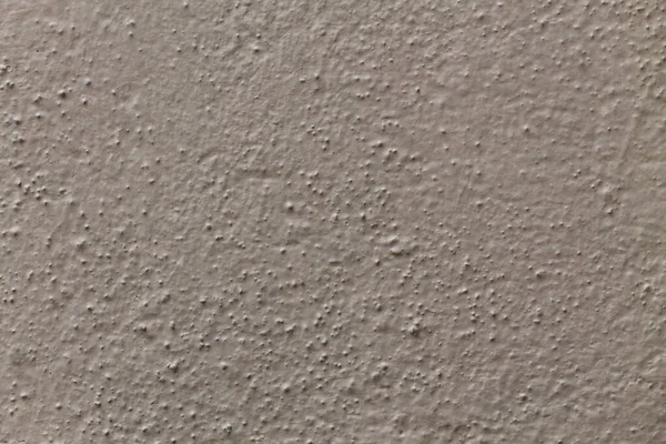 白いペンキで覆われた古いテクスチャの壁のクローズアップショット — ストック写真
