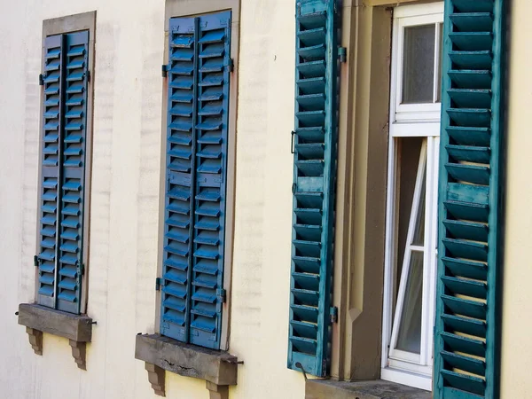 Close Shot Three Old Wooden Windows Rows Blue Shutters — стоковое фото