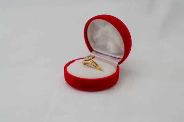 Closeup Red Box Golden Ring White Surface — Stockfoto